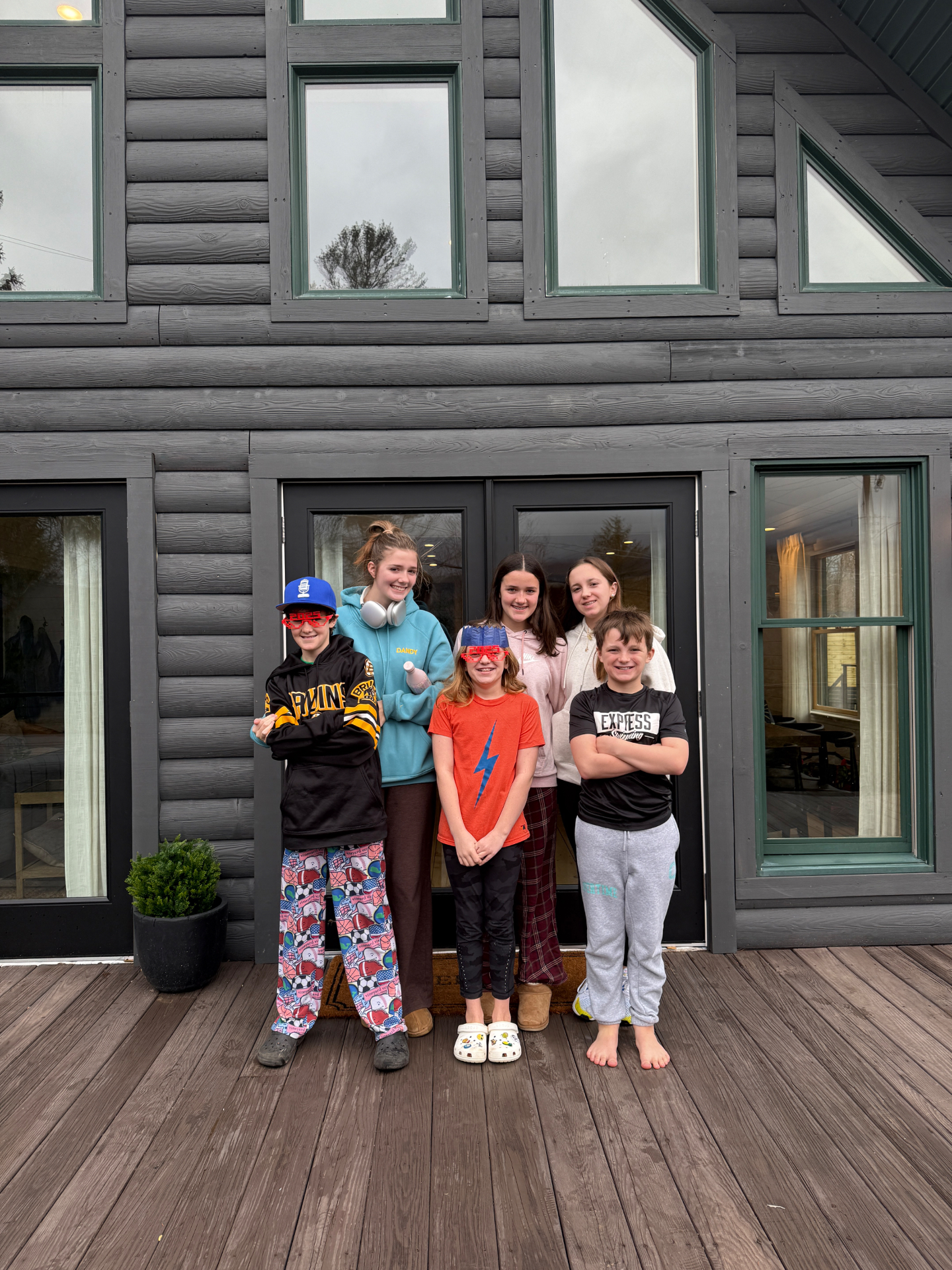 Family in front of the home
